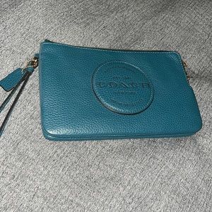 Dark teal Coach wristlet